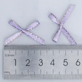 Purple satin mini bows with gold edges measured at 3cm width on a gray surface - Purple