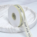 White and gold satin ribbon with black Just For You printing on a plastic spool - Just For You Print / 2.5cm Wide / Beige