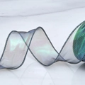 Close-up of 40mm iridescent organza ribbon with wire edge and polar gradient shimmer - Width 4cm Length 9m / Holographic Black