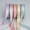 Five rolls of herringbone patterned macaron ribbons in lavender, pink, and grey for DIY gift wrapping - Customizable Color