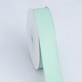 Single roll of mint green matte polyester ribbon on a white spool for gift wrapping - Medium Width Short Roll / Turquoise Green