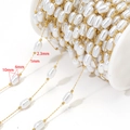 Catena di perle fai-da-te con perle ovali bianche 10x6mm e sfere dorate da 1mm su bobina - Stile Perla Ovale Irregolare 6x10mm
