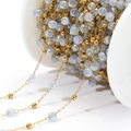 DIY gold beaded chain featuring light blue faceted crystal beads for jewelry making - Transparent Blue