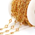 6.6mm gold stainless steel chain with champagne glass beads on a white spool - Light Pink