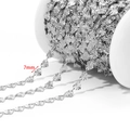 Silver stainless steel heart chain on white spool with 7mm textured heart links - Embossed Heart Chain (7mm) / Steel