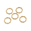 Set of five gold bamboo-style textured stainless steel rings on a clean white background - Gold
