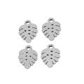 Detailed macro view of four hollow monstera leaf stainless steel pendants for DIY jewelry - Leaf Style / Steel