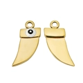 Detailed macro view of golden devil eye dagger pendants for DIY hip hop jewelry making - White