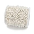 Detailed view of 3mm white beaded DIY jewelry chain wrapped neatly on a white spool - 3mm White Crystal Gold Color Chain