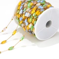 1mm gold stainless steel chain with colorful faceted beads on white spool - Yellow Green Colorful Chain