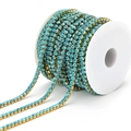 Light blue rhinestone claw chain with gold base on roll for jewelry making - Blue