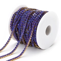 Deep blue rhinestone cup chain with gold claws on a spool for DIY jewelry making - Sapphire Blue