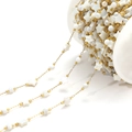 DIY golden bead chain with star-shaped white shell charms wound on a spool roll - Round Bead And Star (F2278)