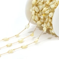 DIY jewelry chain with 4mm irregular white shell beads on a gold spool for craft making - 4-7mm Irregular Light Yellow Shell Chain