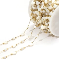 DIY golden bead chain with heart mother-of-pearl shells on a white plastic spool - Round Bead And Heart (F2278)