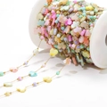 Colorful shell charm chain with gold links and mixed butterfly beads on spool - 9mm Butterfly Colorful Shell 0.8 Gold Chain With 4mm Beads