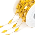 Golden chain with yellow oval glass beads on a spool for DIY jewelry making - Lemon Yellow