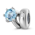S925 silver ring featuring a large six-prong blue stone with a beaded metal charm - December Light Blue