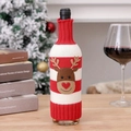 Detail of red and white striped knitted Christmas wine bottle cover with reindeer motif - Reindeer Style