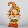 Gnome d'automne debout avec feuilles d'érable et tournesol pour décoration de récolte - Style Femme