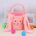 Pink plush Easter bunny basket with long floppy ears and cute embroidery for candy storage - Pink