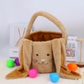 Plush brown Easter bunny basket with long ears and embroidery on a cozy background - Brown