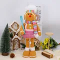 Detailed close-up of a gingerbread man plush toy wearing a chef hat and scarf for Christmas - Gingerbread Man Chef Style (0925)