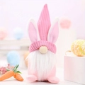 Detalle de gnomo de Pascua de peluche con gorro rosa tejido y larga barba blanca suave - Rosa