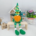 Detail of St. Patrick's Day gnome doll with Ireland Forever flag on a wooden bench - Male Style
