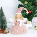 Detail of pink Christmas angel figurine with feather wings and sparkling sequins - Pink Hat Style