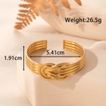 Elegante bracciale rigido a nodo dorato con linee multistrato in acciaio inossidabile - Stile Nodo Celtico (YB-134)