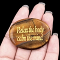 Tiger's eye worry stone engraved with gold text Relax the body calm the mind - Tiger's Eye