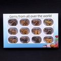 Set mit 12 geschnitzten Tigerauge-Elefantenfiguren in einer weißen Geschenkbox - Tigerauge