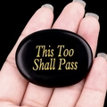 Polished black agate palm stone with golden 'This Too Shall Pass' engraving - Obsidian