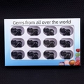 Set of 12 hand-carved black gemstone elephant figurines in a white display gift box - Set of 12 / Obsidian