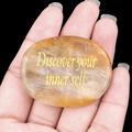Golden engraved Discover your inner self phrase on polished yellow agate worry stone - Yellow Jade