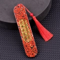 Segnalibro in resina con diaspore rosso, fiore della vita dorato e nappa coordinata - Diaspro Rosso