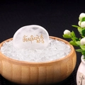 Buddhist Om Mani Padme Hum white crystal palm stone in a bamboo bowl with pebbles - White Crystal