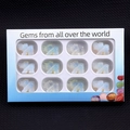 Set of 12 hand-carved opal elephant figurines in a white display box with windows - Set of 12 / Opal (Synthetic)