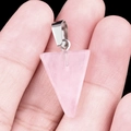 Pink rose quartz triangle pendant with silver metal bail held by fingers - Rose Quartz