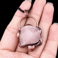 Vintage necklace with raw pink quartz stone pendant and bronze claw on black rope - Rose Quartz
