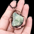 Vintage green raw stone pendant necklace with antique copper base and black cord - Fluorite