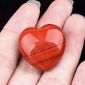 Polished heart-shaped natural red jasper stone pendant with unique black veins - Red Jasper