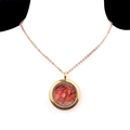 Golden stainless steel locket necklace with red agate crystal stones on a model - Red Agate