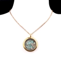 Gold floating locket necklace with natural light green crystal stones on a neck mannequin - Amazonite