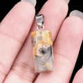 Handheld bumblebee jasper cylinder pendant with natural yellow and black patterns - Crazy Agate