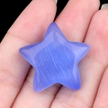 Piedra de ojo de gato azul en forma de estrella con textura sedosa y acabado pulido - Azul claro