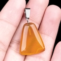 Trapezoid orange crystal pendant with natural texture and polished silver bail - Agate
