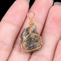 Handmade wire-wrapped brown natural raw gemstone pendant with golden wire detail - Labradorite