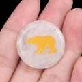 Translucent crystal round pendant featuring a golden bear silhouette in matte finish - White Crystal